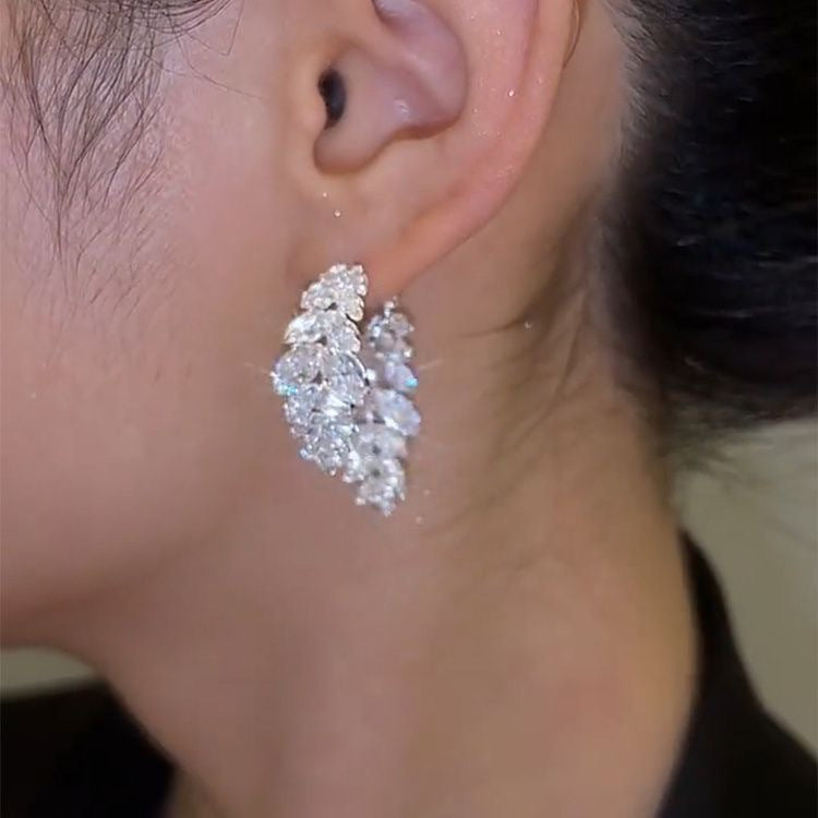Fully Diamond-studded Leaf Earrings For A Sophisticated Lookwearable On Either Side